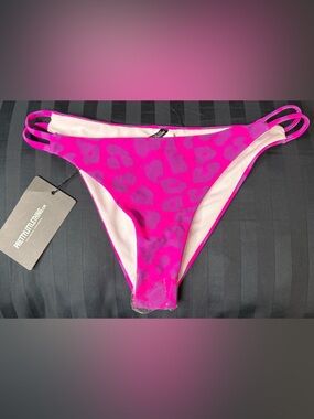 Pretty little thing cheetah print cut out bikini bottom size 4 NWT